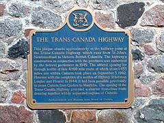 Sign markeing mid-point of Trans-Canada Highway