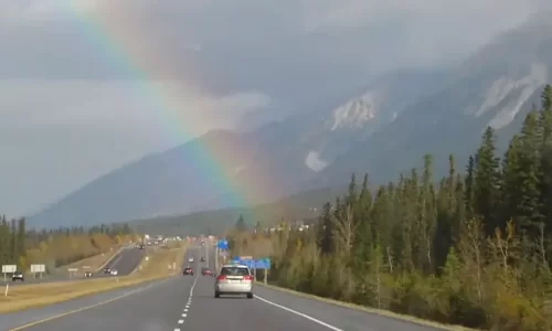 Weather, Construction, and Detours (rainbow near Canmore, Alberta)